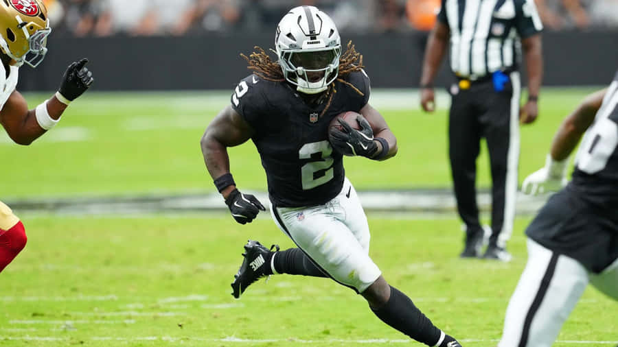 Ashton Jeanty Running Play Wallpaper