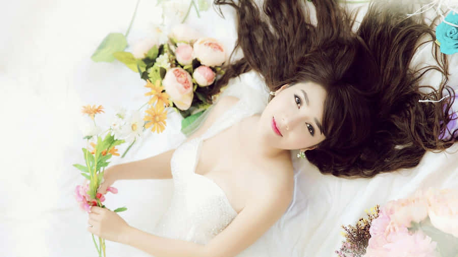 Asian Bride Laying Down Wallpaper