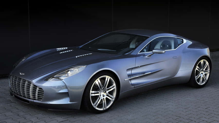 Aston Martin One-77 - Sleek And Stylish Luxury Sports Car In Motion Wallpaper