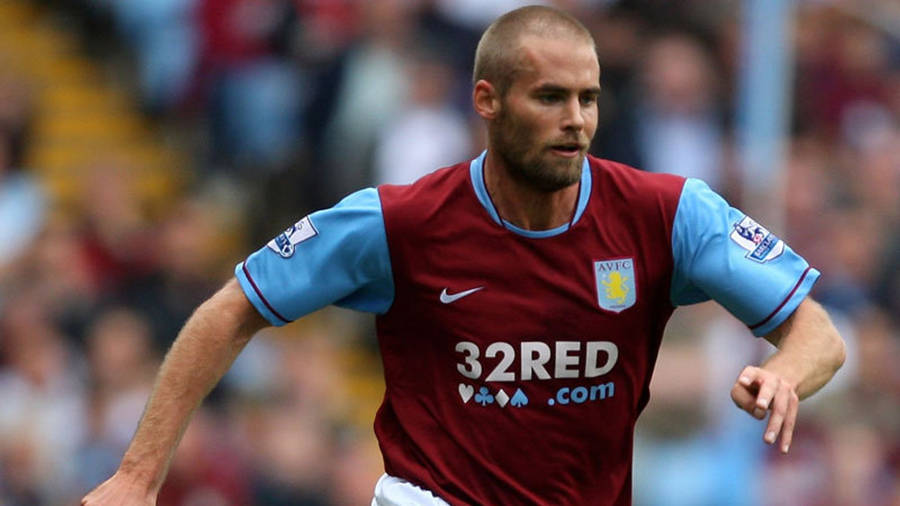 Aston Villa's Mellberg Running Wallpaper