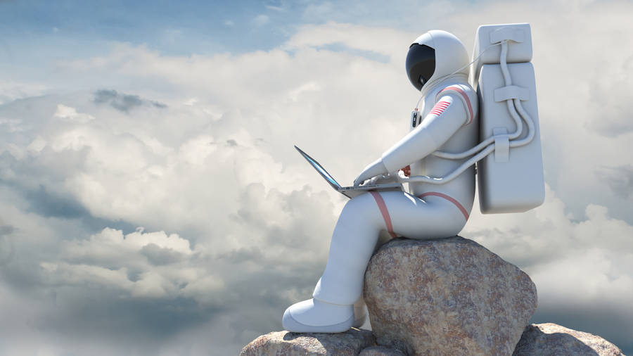 Astronaut Working On Computer Wallpaper