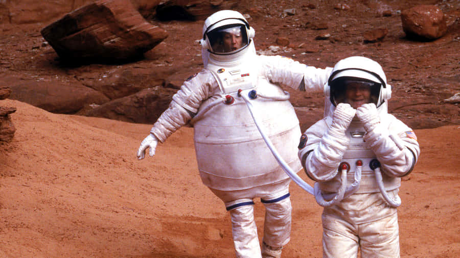 Astronauts_on_ Martian_ Terrain_ Simulation Wallpaper