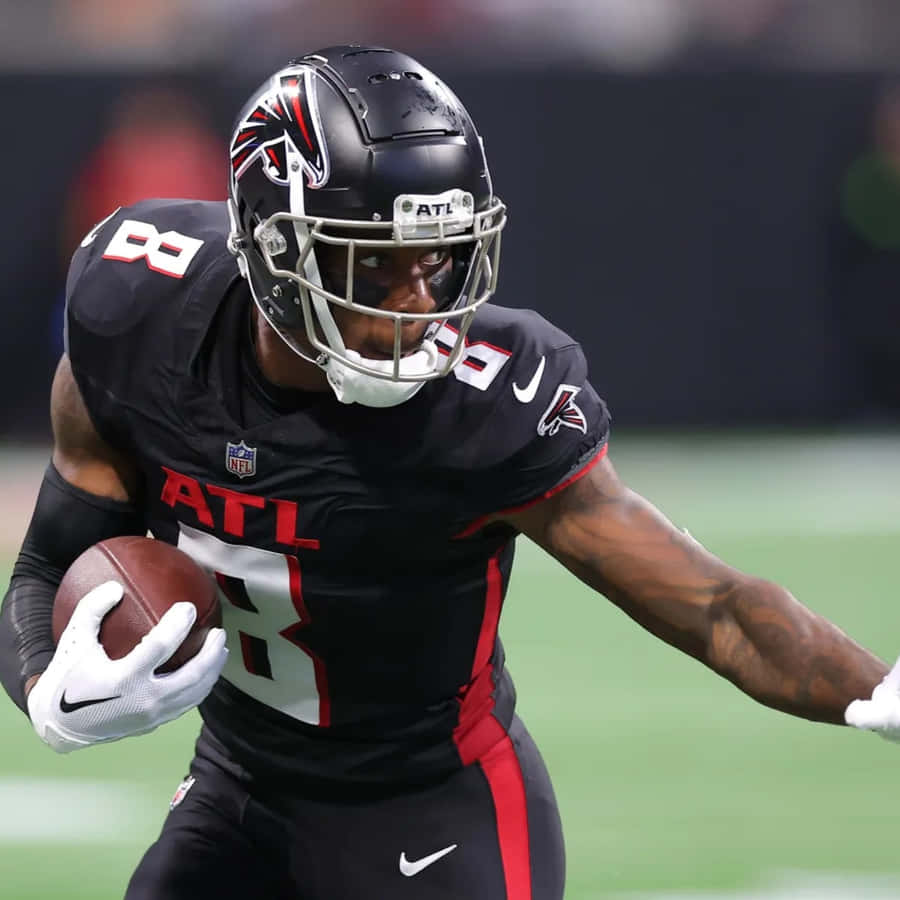 Atlanta Falcons Player Running With Football Wallpaper