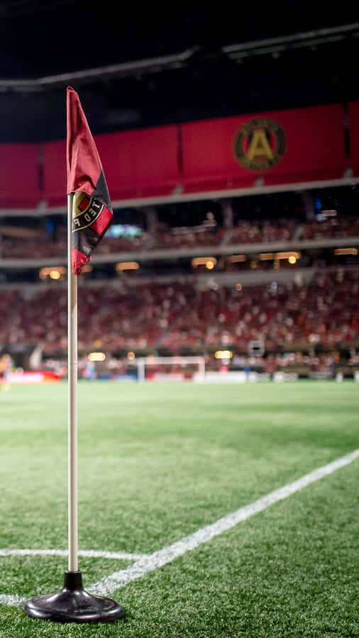 Atlanta United Fc Flag And Supporters At Mercedes Benz Stadium Wallpaper