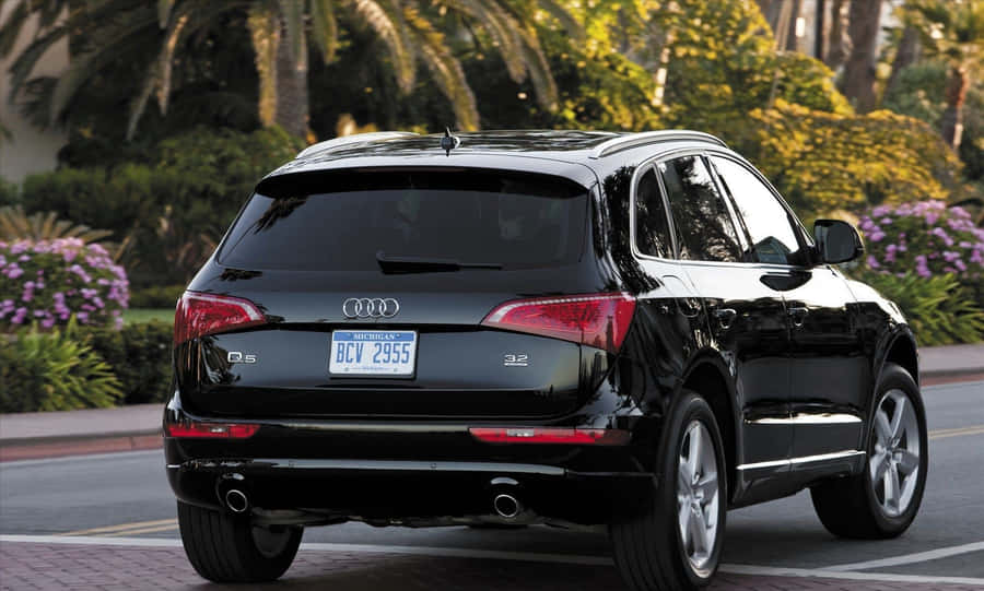 Audi Q5 Luxury Suv On Open Road Wallpaper