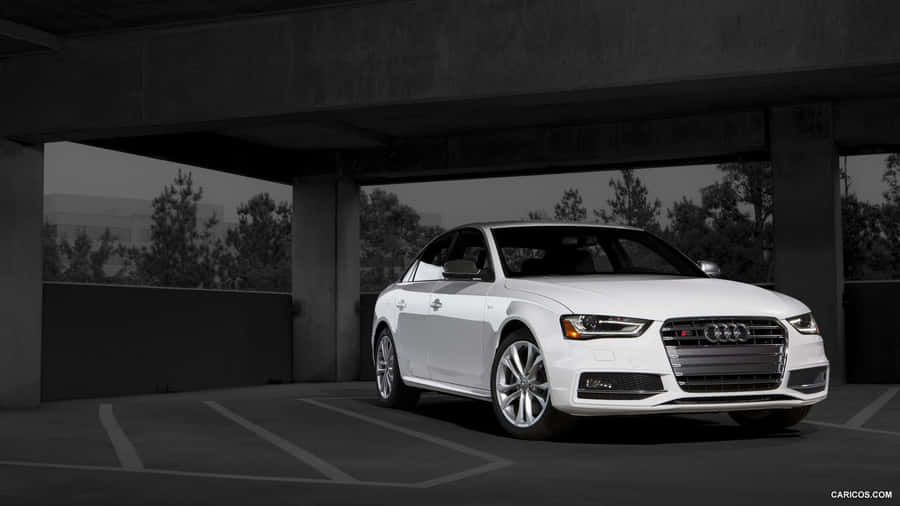 Audi S4 In Motion: Power And Luxury On Display Wallpaper