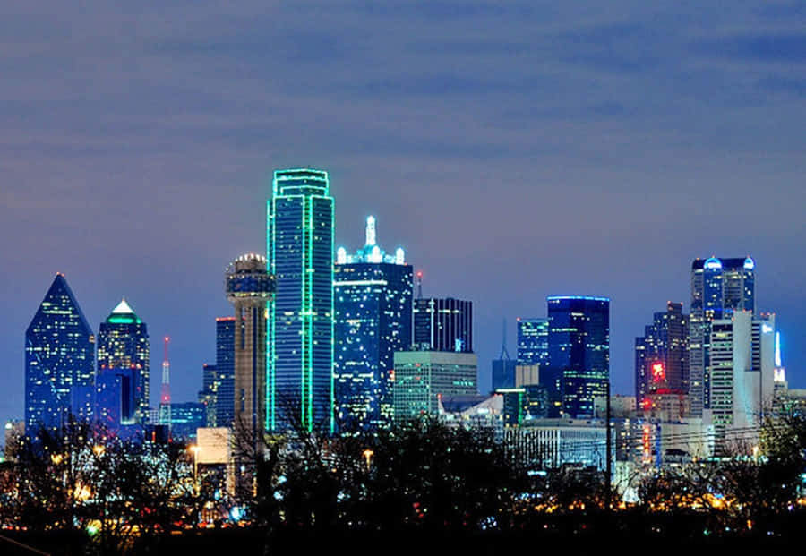 Awe-inspiring Dallas Skyline At Dusk Wallpaper