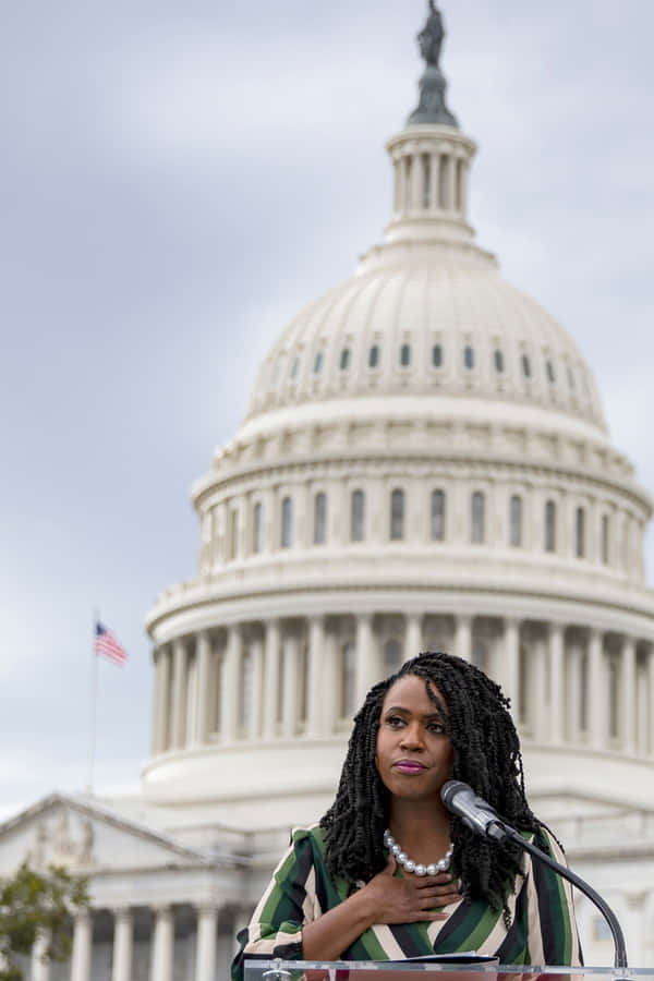Ayanna Pressley, Speaking Passionately At A Capitol Event Wallpaper