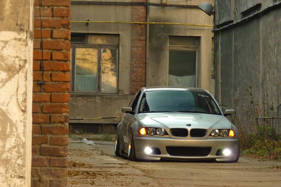 B M W E46 Silver Sedan Urban Backdrop Wallpaper