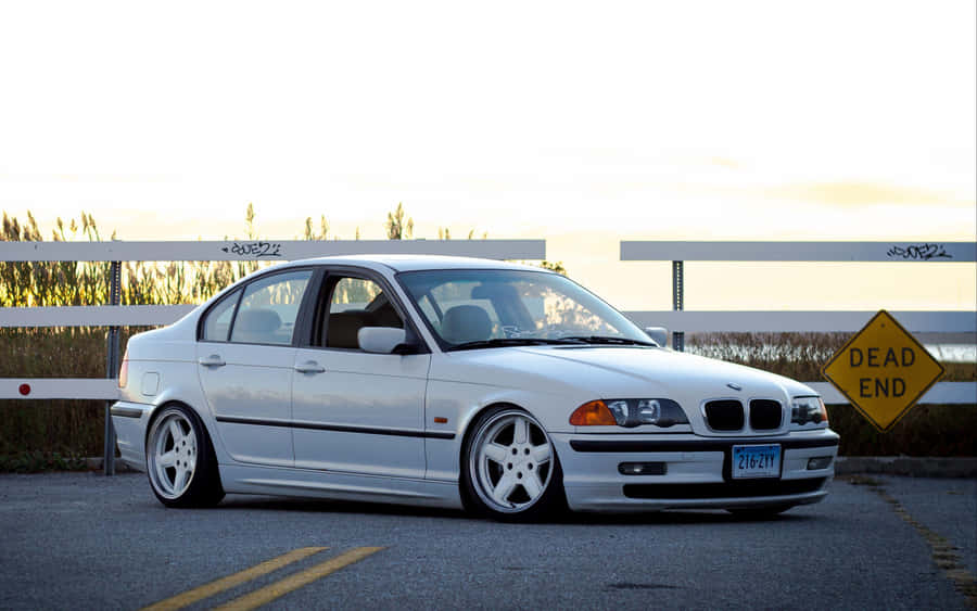 B M W E46 Silver Sedanat Sunset Wallpaper
