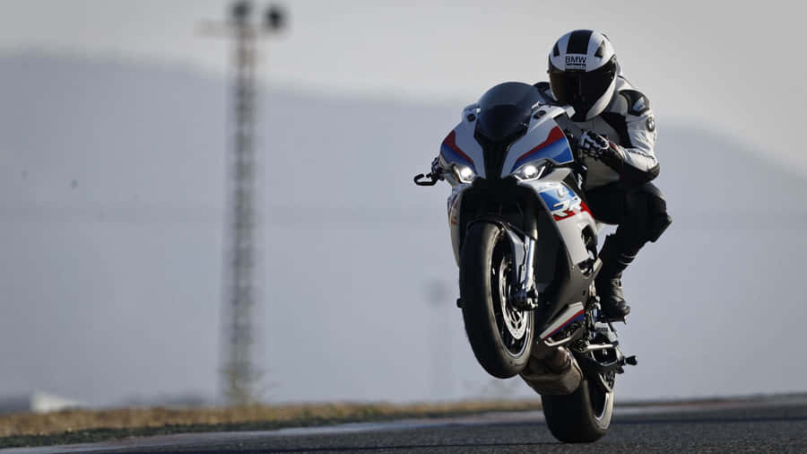 B M W S1000 R R Wheelie Action Wallpaper