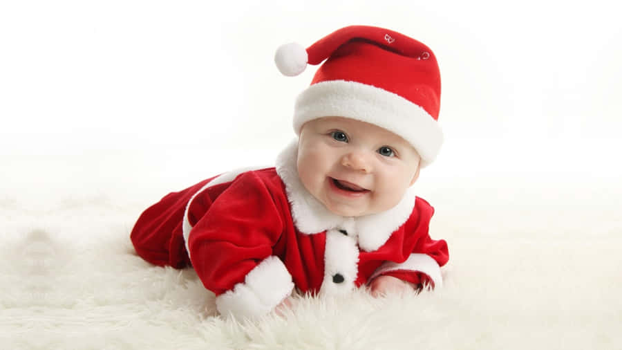 Baby Wearing Christmas Hat Wallpaper