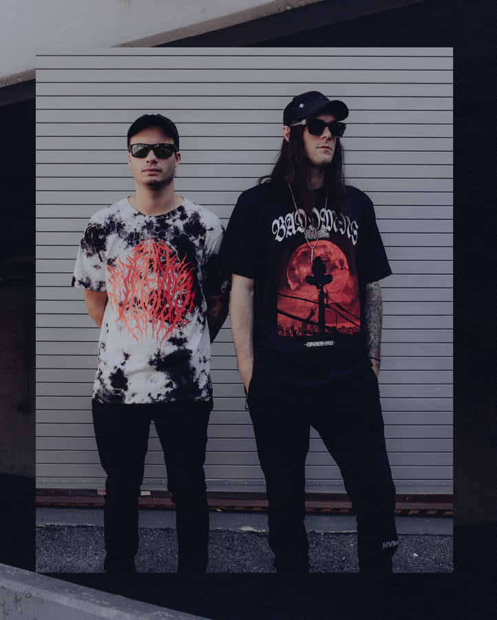 Bad Omens Band Members Standing Against Striped Wall Wallpaper