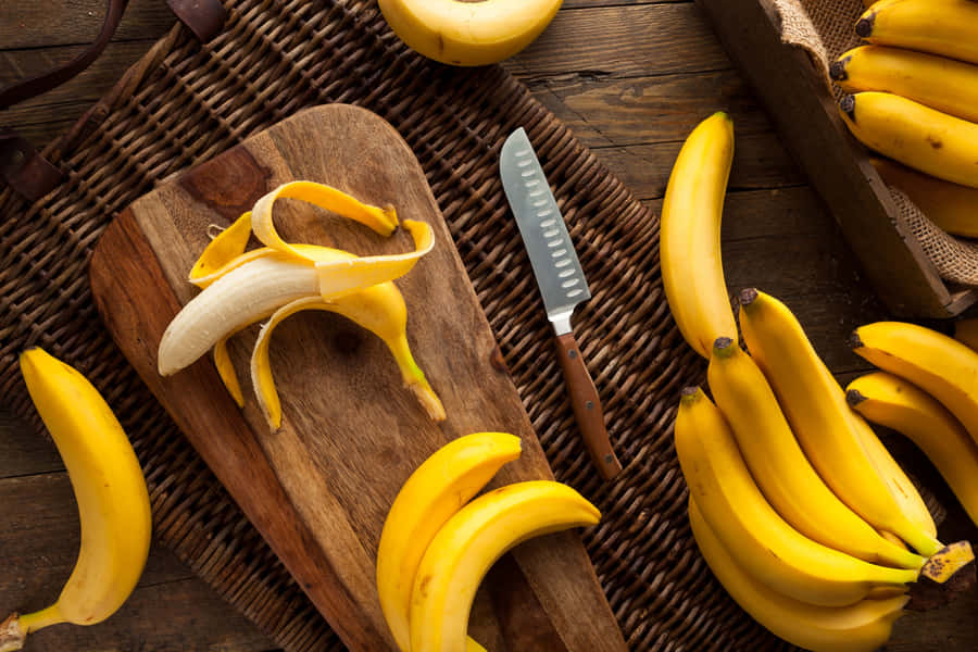 Bananas And Cutting Board Wallpaper