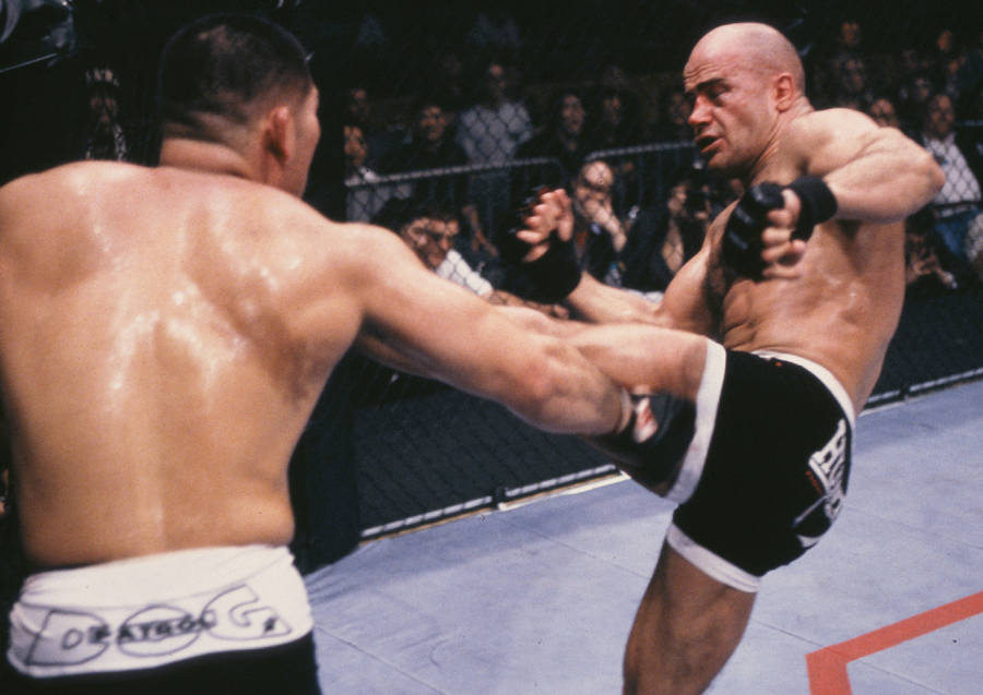 Bas Rutten Kicking Opponent Wallpaper
