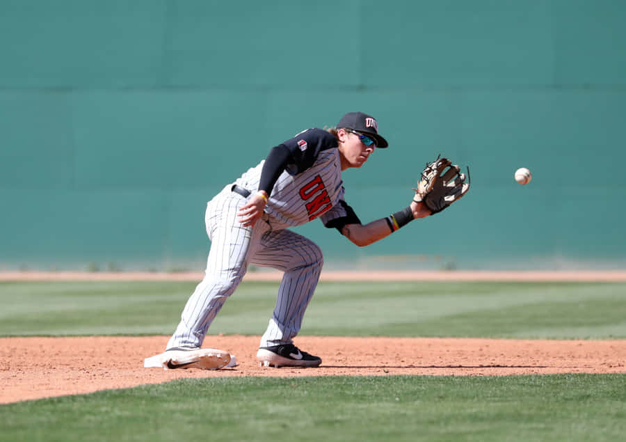 Baseball Infielder Fielding Ball.jpg Wallpaper