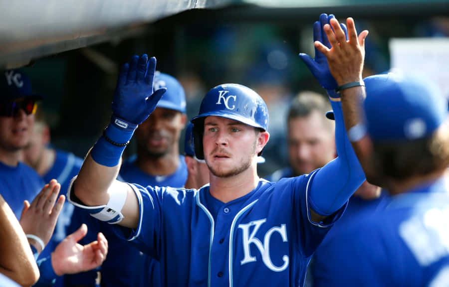 Baseball Player Celebratingwith Team Wallpaper