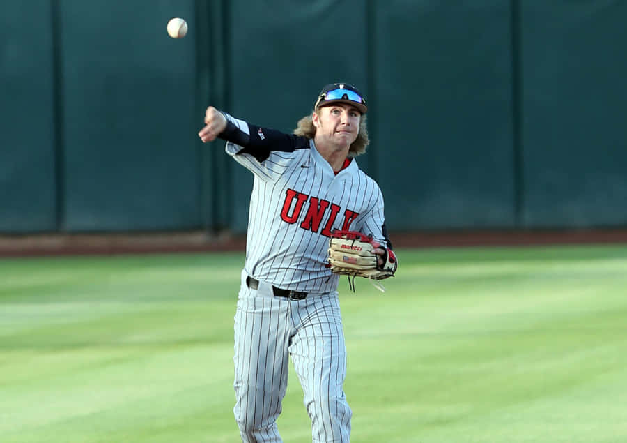 Baseball Player Throwing Ball During Game.jpg Wallpaper