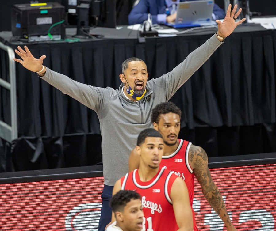 Basketball Coach Gesturing During Game Wallpaper