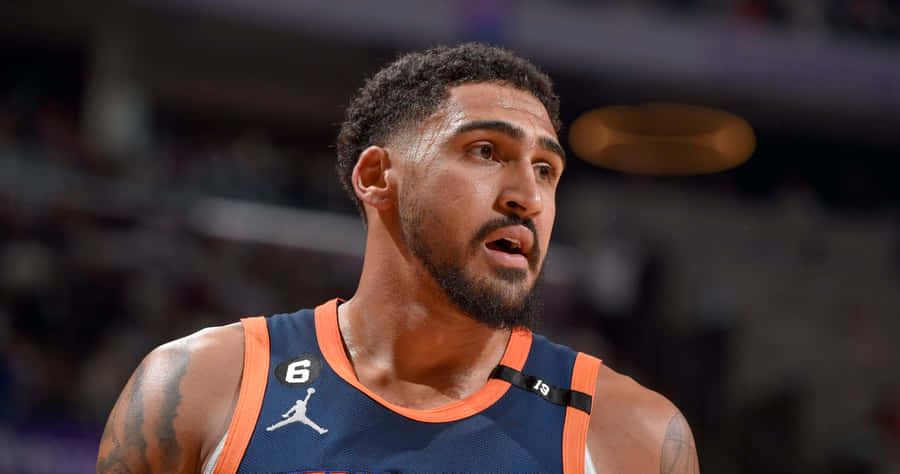 Basketball Player Concentration During Game Wallpaper