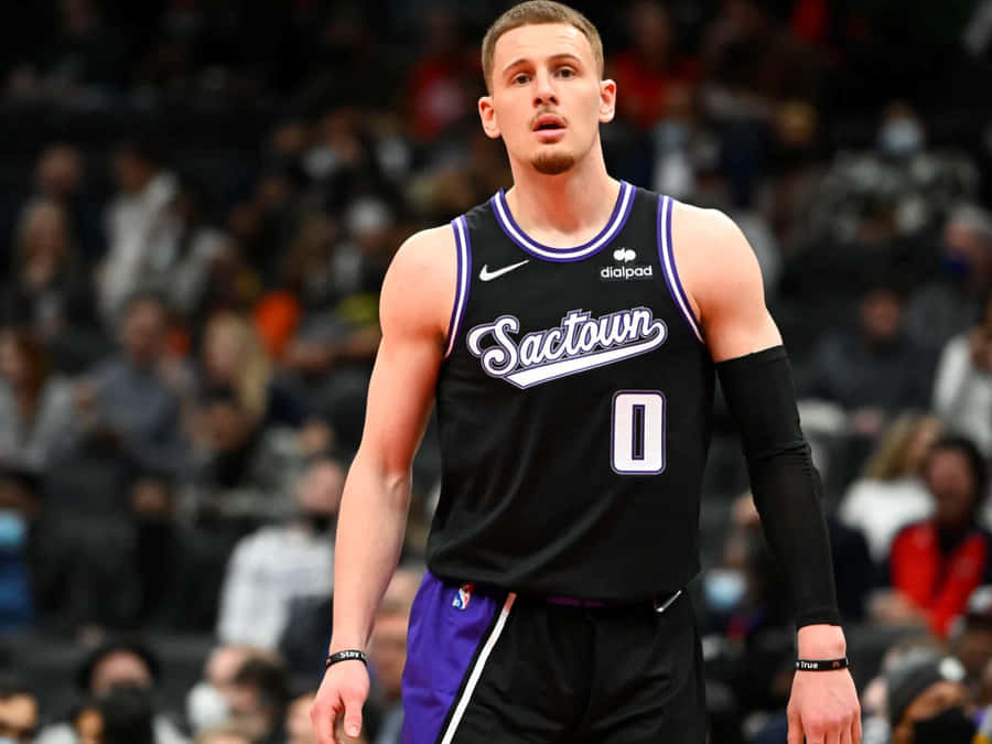 Basketball Player Donte Di Vincenzo Sactown Jersey Wallpaper