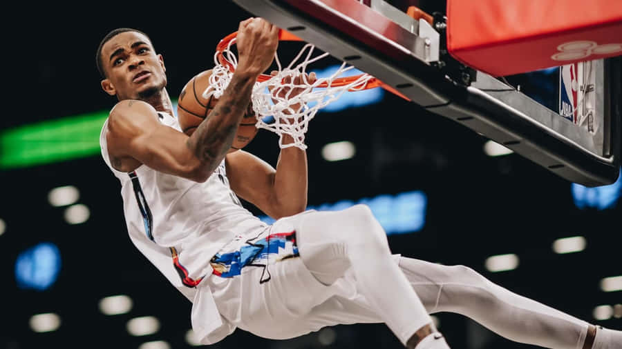 Basketball Player Dunking During Game.jpg Wallpaper