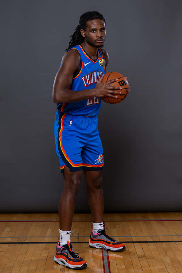 Basketball_ Player_in_ Blue_ Uniform Wallpaper