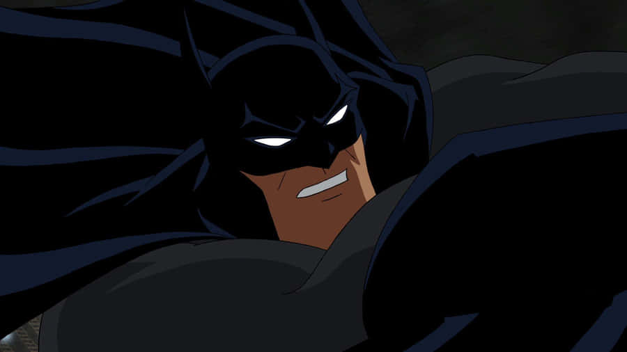 Batman And Red Hood Face-off In A Clamorous Clash Wallpaper