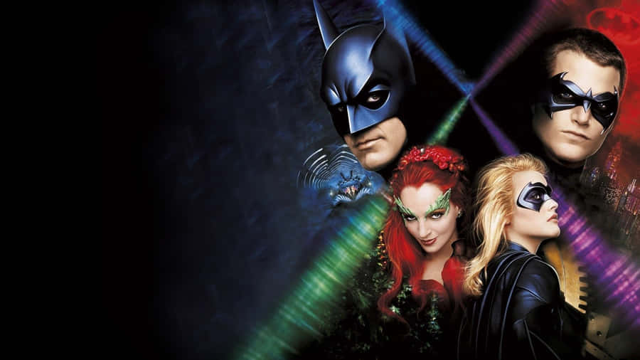 Batman And Robin Standing Tall In Gotham City Wallpaper