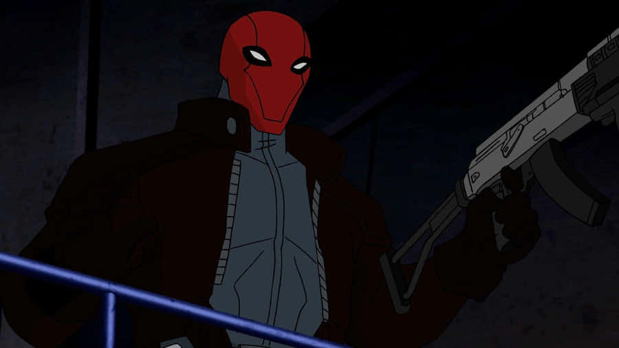 Batman Faces Red Hood In An Intense Confrontation Wallpaper
