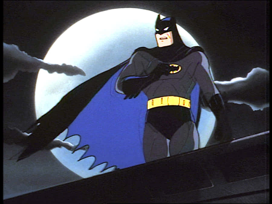 Batman Standing On Top Of A City Building, Overlooking Gotham City In Batman Animated Adventures. Wallpaper