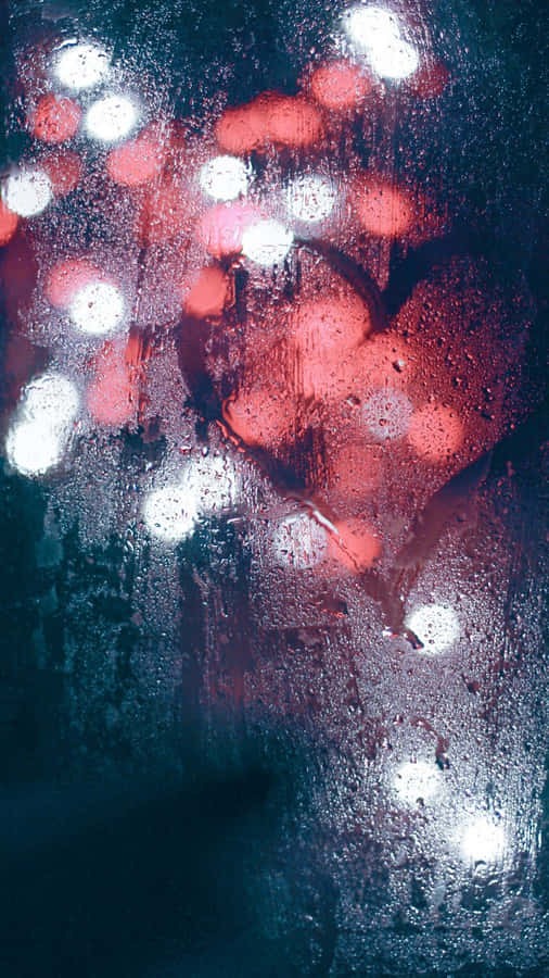 Beautiful Red Heart Shape On A Pink Background Wallpaper