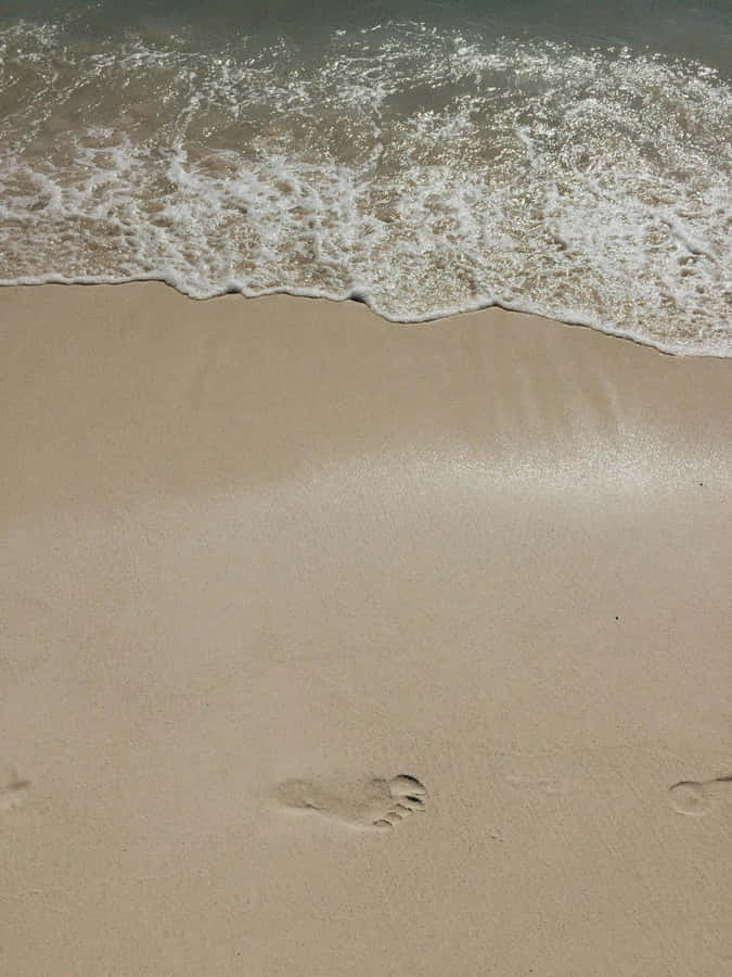 Beige Beach Footprints Waves Wallpaper