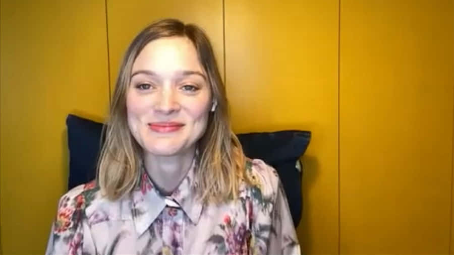 Bella Heathcote Floral Top Yellow Background Wallpaper