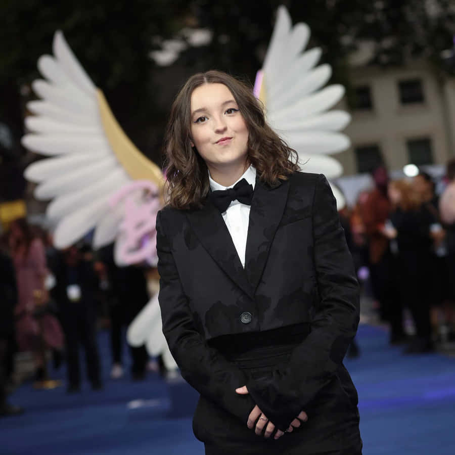 Bella Ramsey Angelic Backdrop Event Wallpaper