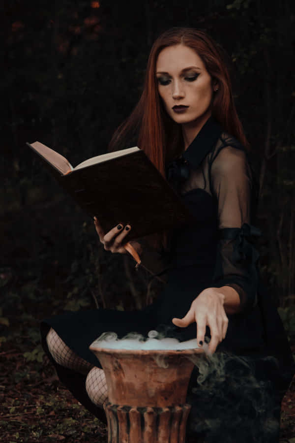 Bewitching Halloween Witch Costume Wallpaper