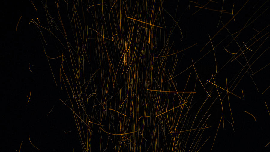 Black And Gold Spark Lines Wallpaper
