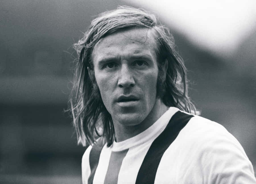 Black And White German Soccer Player Günter Netzer Tight Shot Wallpaper