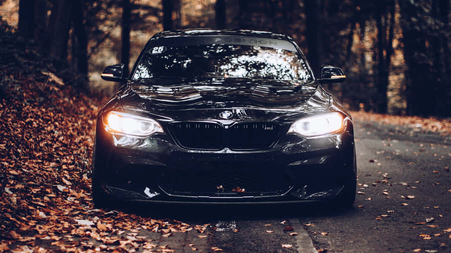 Black Car Autumn Road Trip Wallpaper