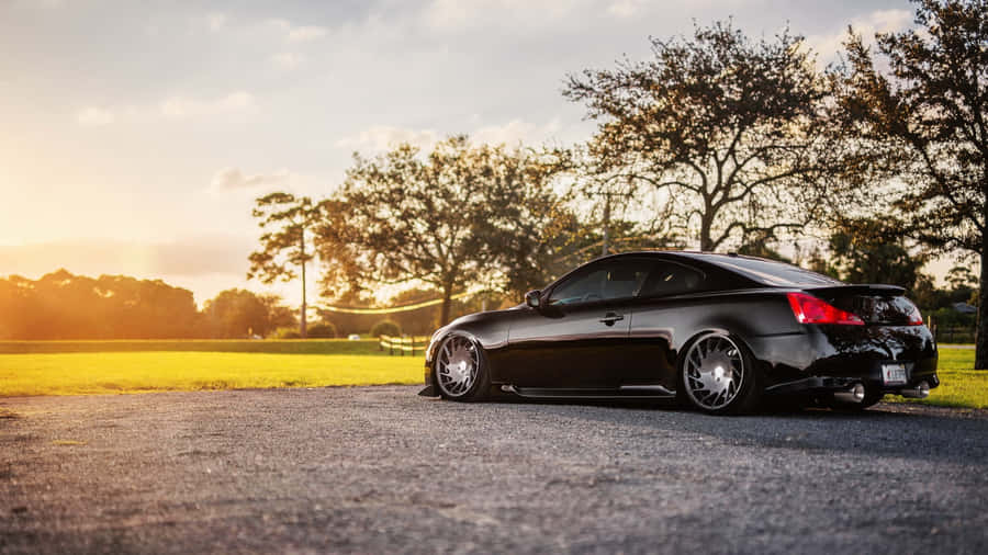 Black Coupe Sunset Park Wallpaper