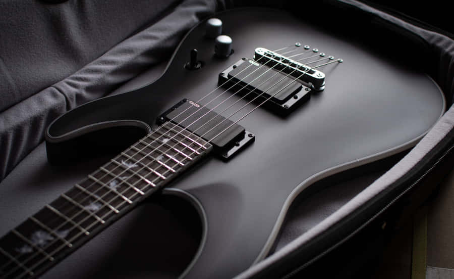 Black Electric Guitarin Case Wallpaper