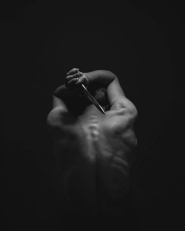 Black Spooky Paranormal Man Dagger Wallpaper