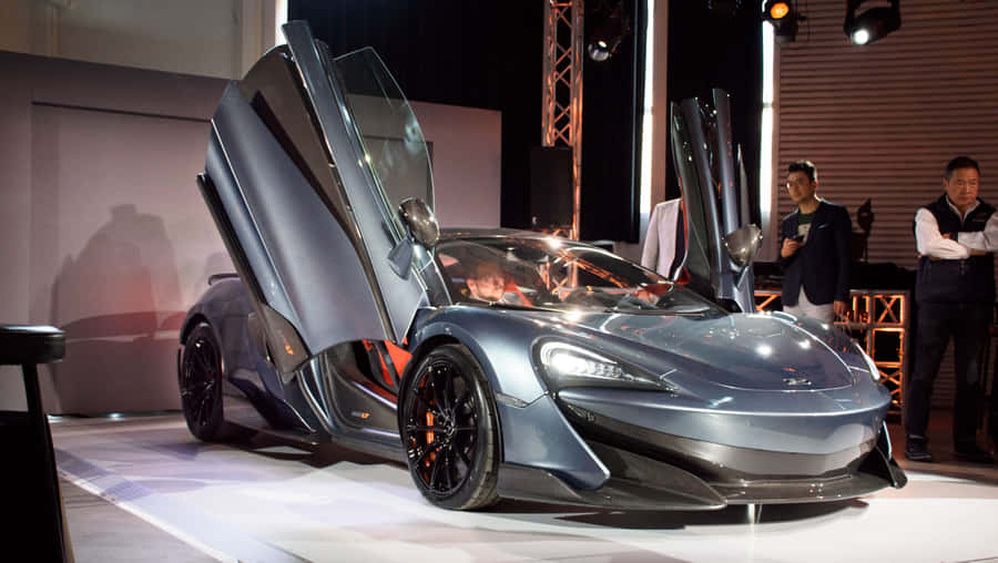 Blazing Through The Streets - Mclaren 600lt Spider Wallpaper