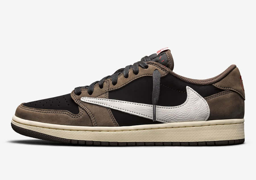 Blending Style And Comfort With The Travis Scott Jordan 1 Sneaker. Wallpaper