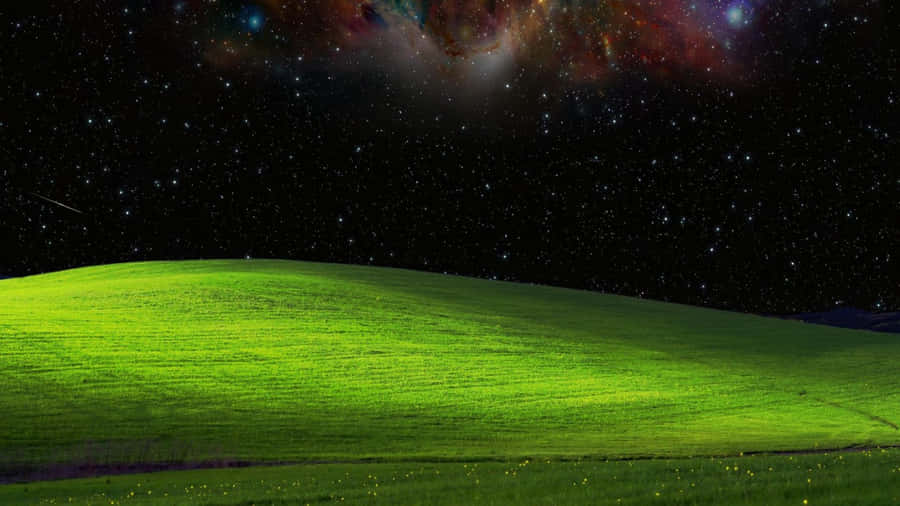 Blissful Green Hill Under Stars Wallpaper