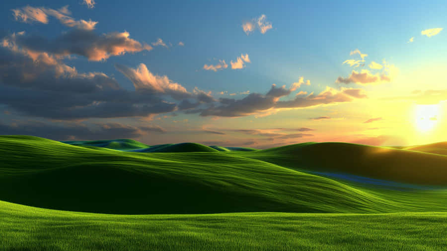 Blissful Green Hills Sunset Wallpaper