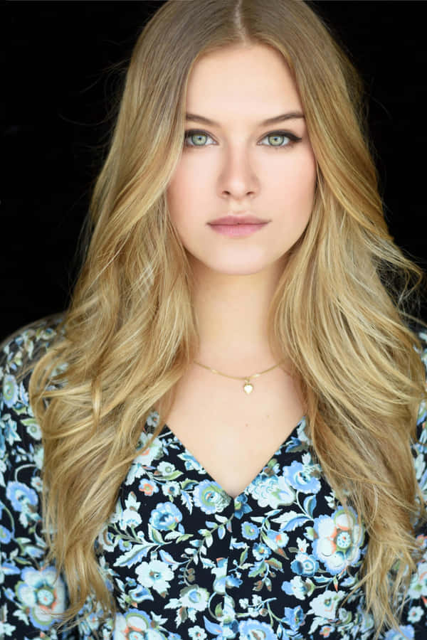 Blonde Woman Floral Top Portrait Wallpaper
