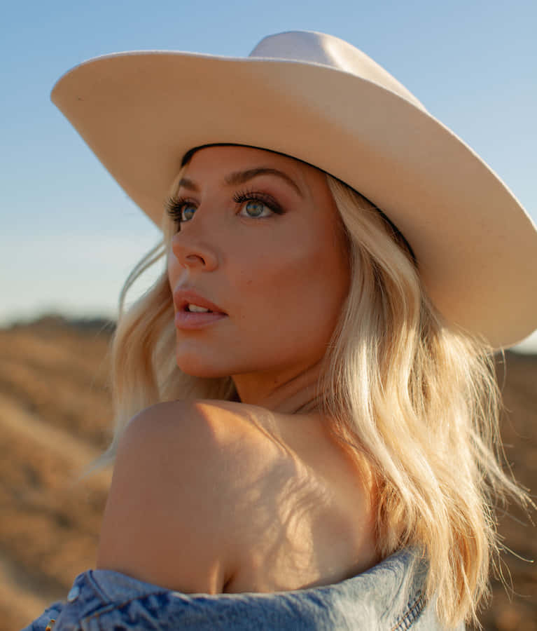 Blonde Womanin White Hat Wallpaper