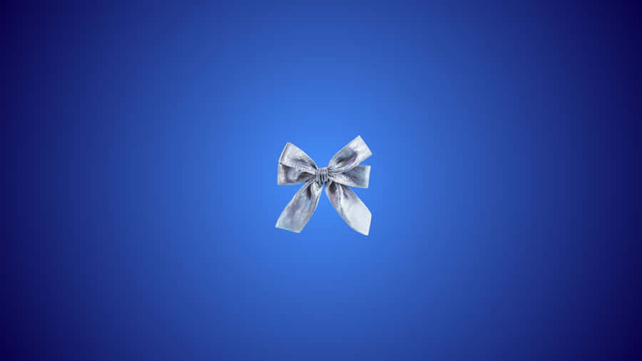 Blue Bow On Blue Background Wallpaper