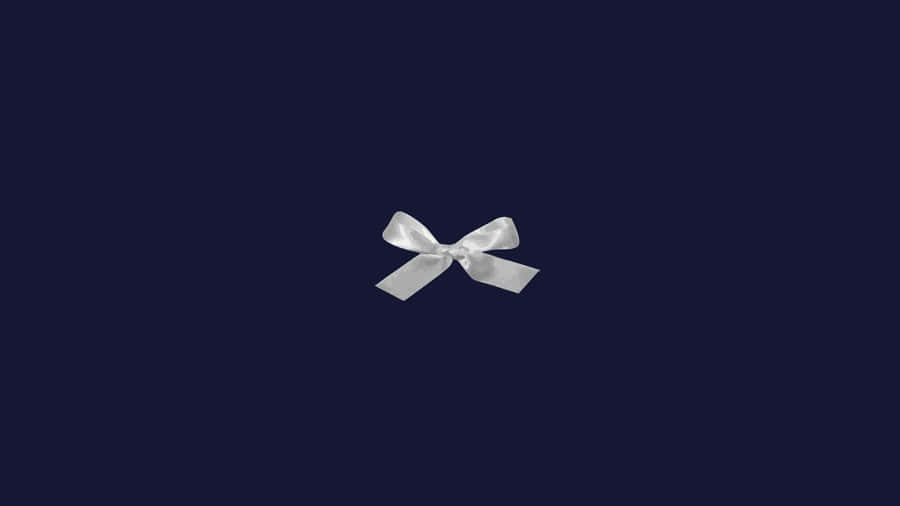 Blue Bow On Dark Background Wallpaper